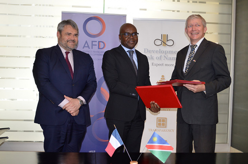 Funding for research into women entrepreneurs and low cost housing. FLTR: H.E. M Sébastien Minot (French Ambassador to Namibia), Martin Inkumbi (DBN CEO) and M Bruno Deprince (Regional Director of AFD Southern Africa).